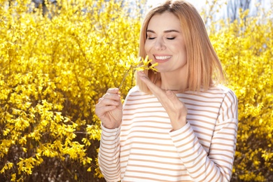 Photo of Happy healthy woman enjoying springtime outdoors, space for text. Allergy free concept