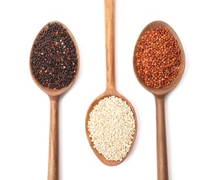 Photo of Spoons with different types of quinoa on white background, top view