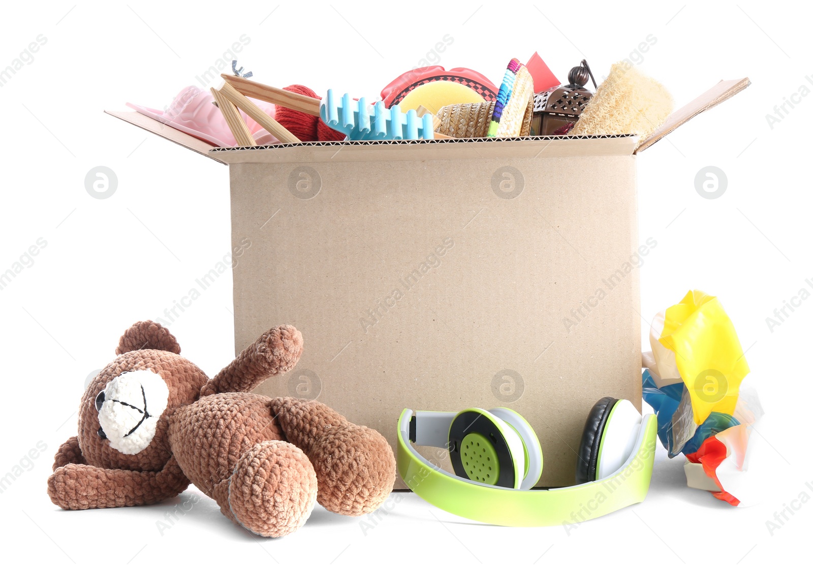 Photo of Box of unwanted stuff isolated on white