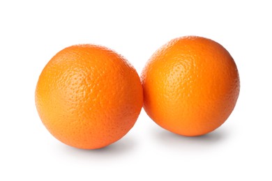 Photo of Delicious fresh ripe oranges on white background