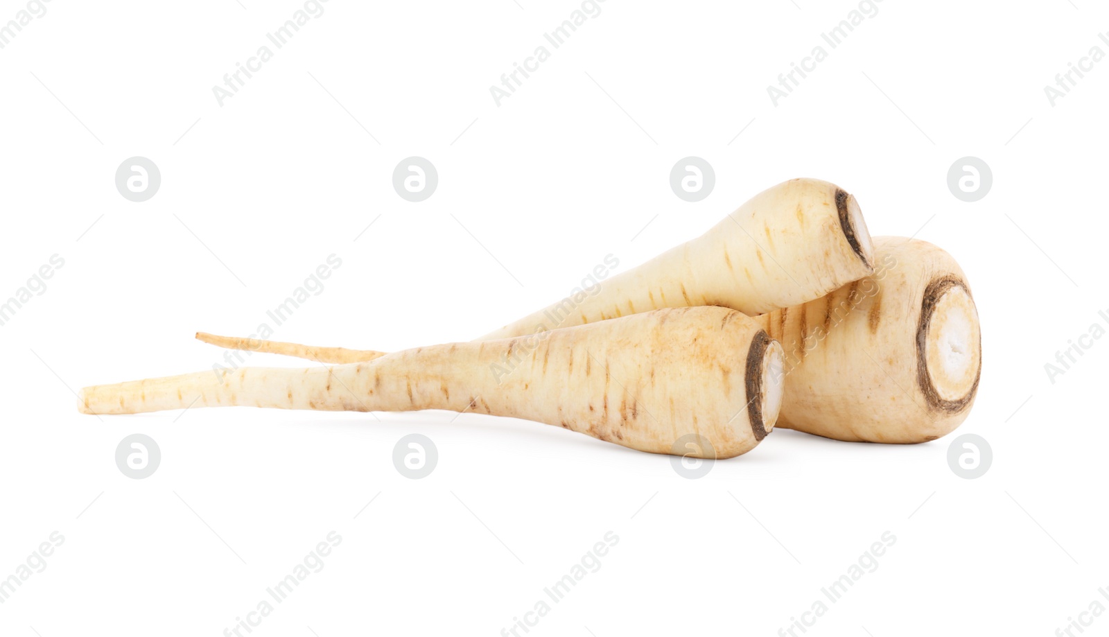 Photo of Tasty fresh ripe parsnips on white background