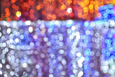 Photo of Blurred shiny lights as background. Bokeh effect