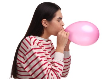 Photo of Woman inflating pink balloon on white background