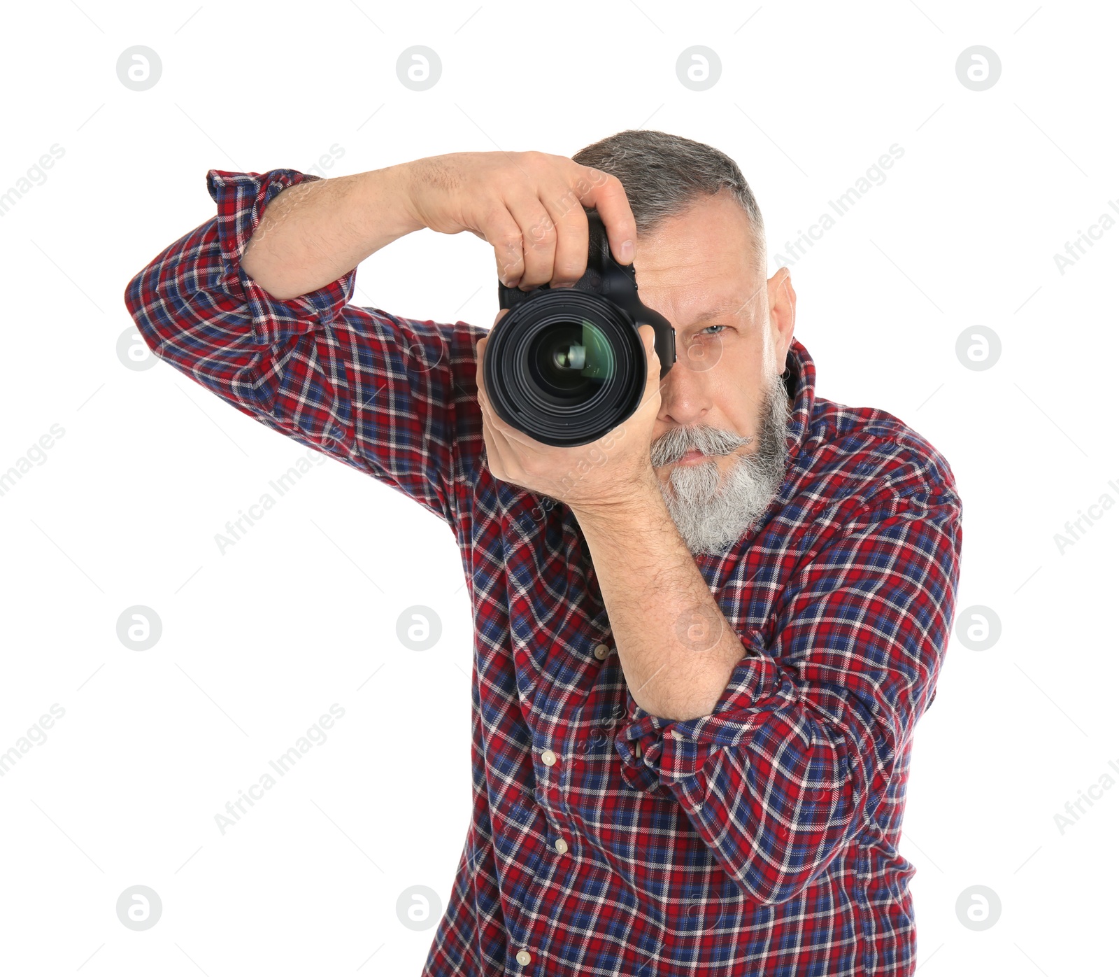 Photo of Mature male photographer with camera on white background