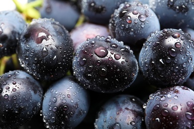 Photo of Bunch of fresh ripe juicy grapes as background, closeup