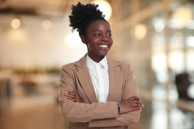 Image of Lawyer, consultant, business owner. Confident woman smiling indoors