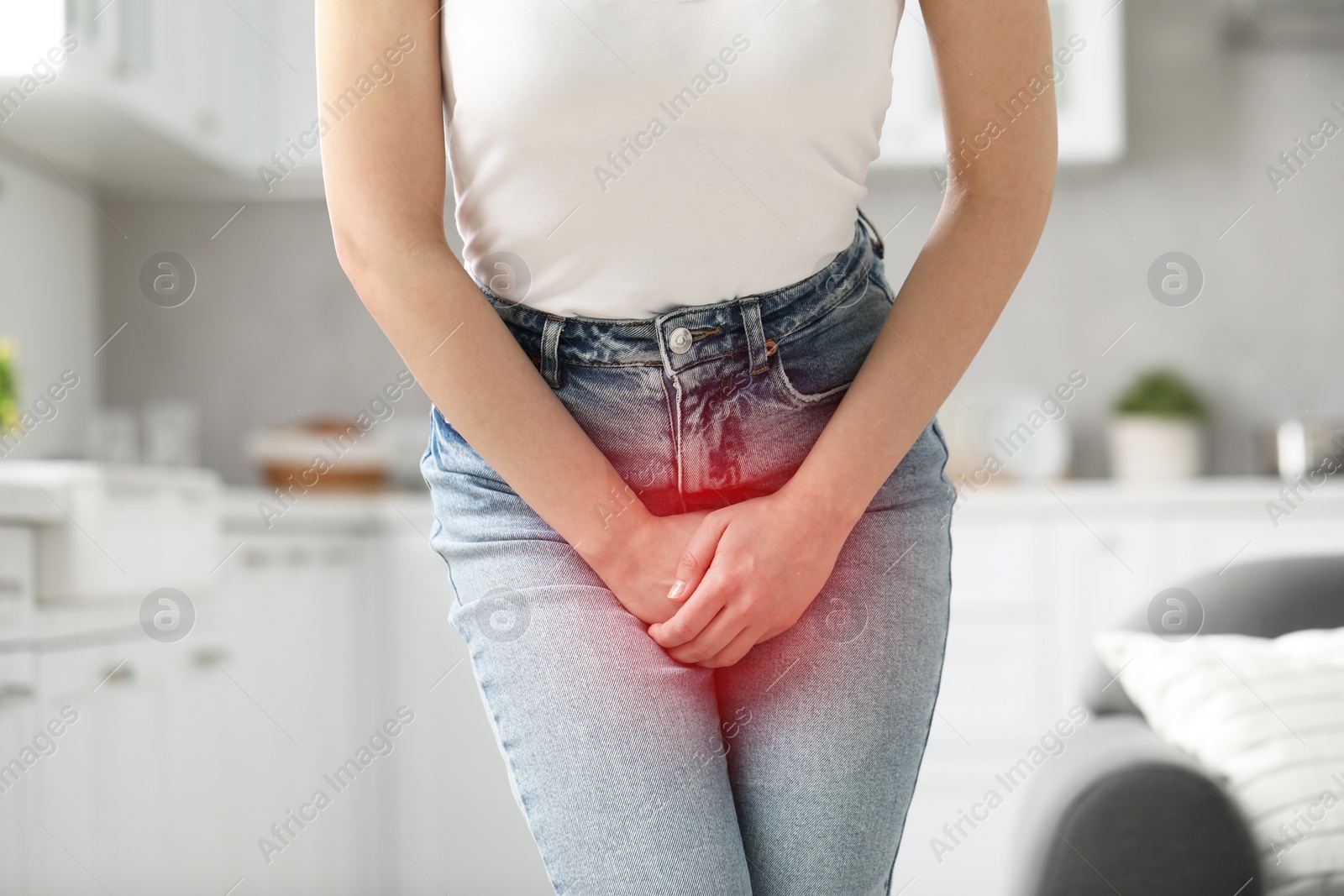 Image of Woman suffering from cystitis symptoms indoors, closeup