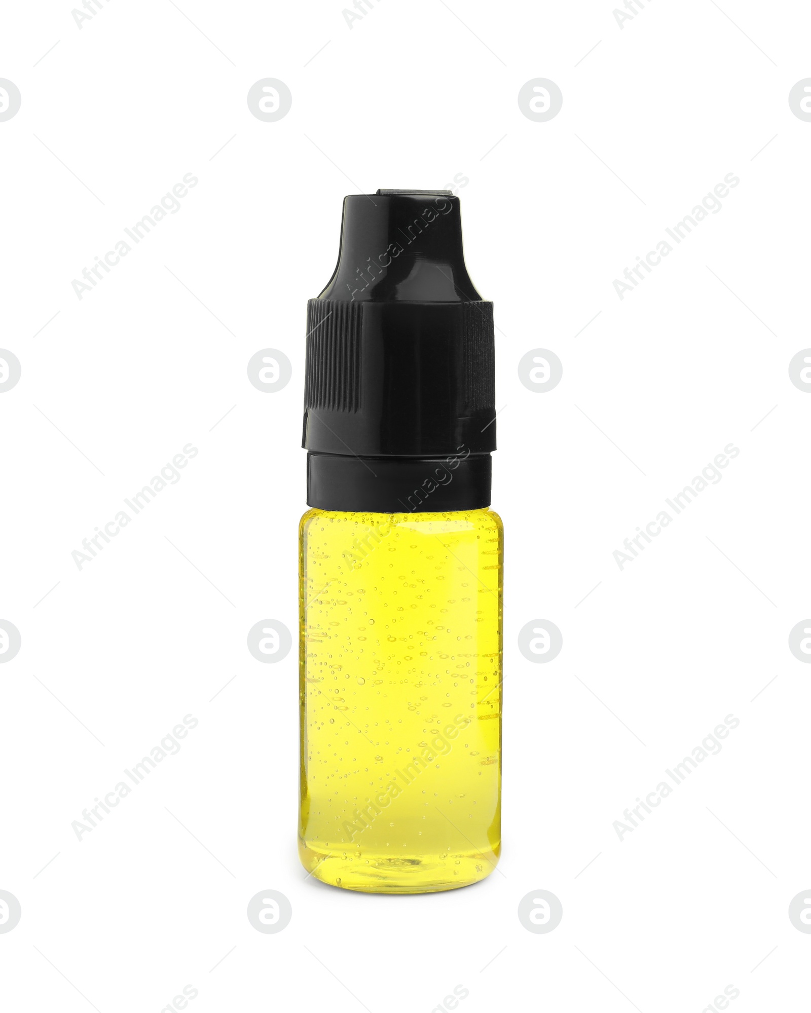 Photo of Bottle of yellow food coloring on white background