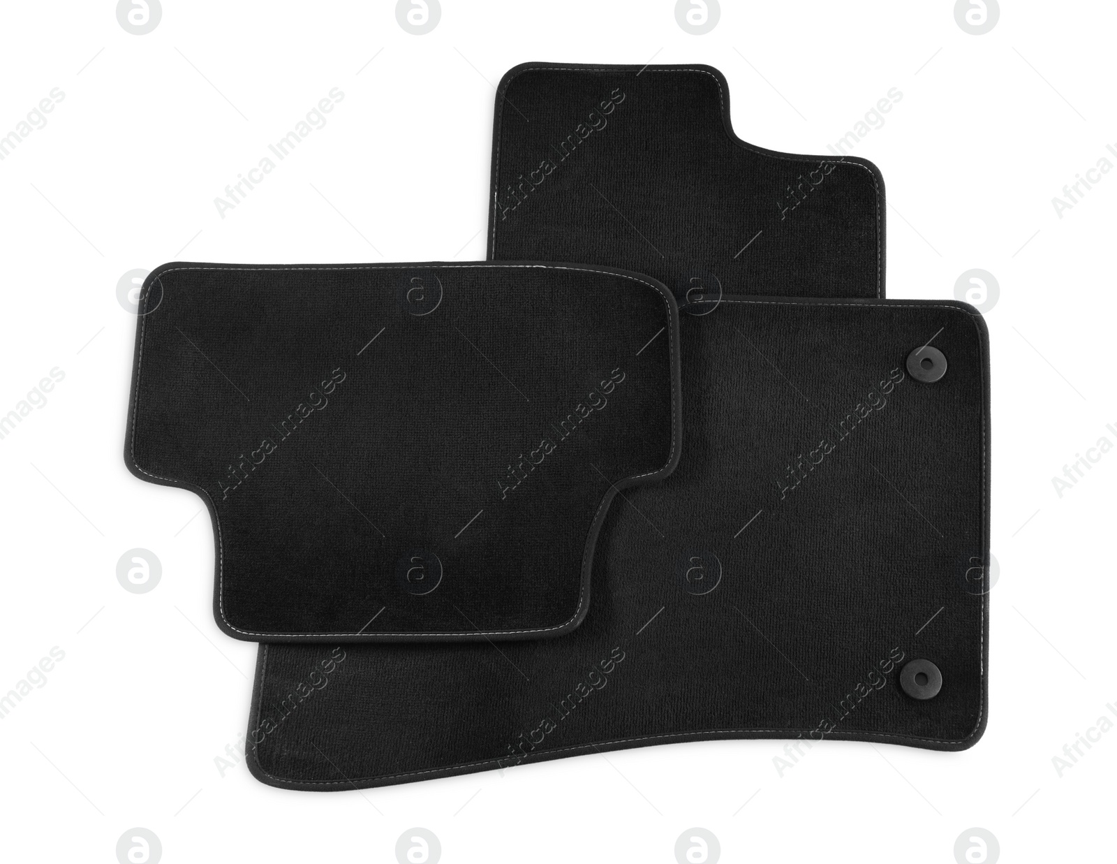 Photo of Black car floor carpets on white background, top view