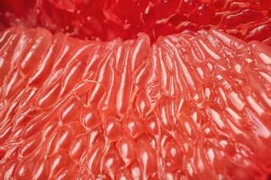 Photo of Texture of fresh ripe grapefruit, closeup view