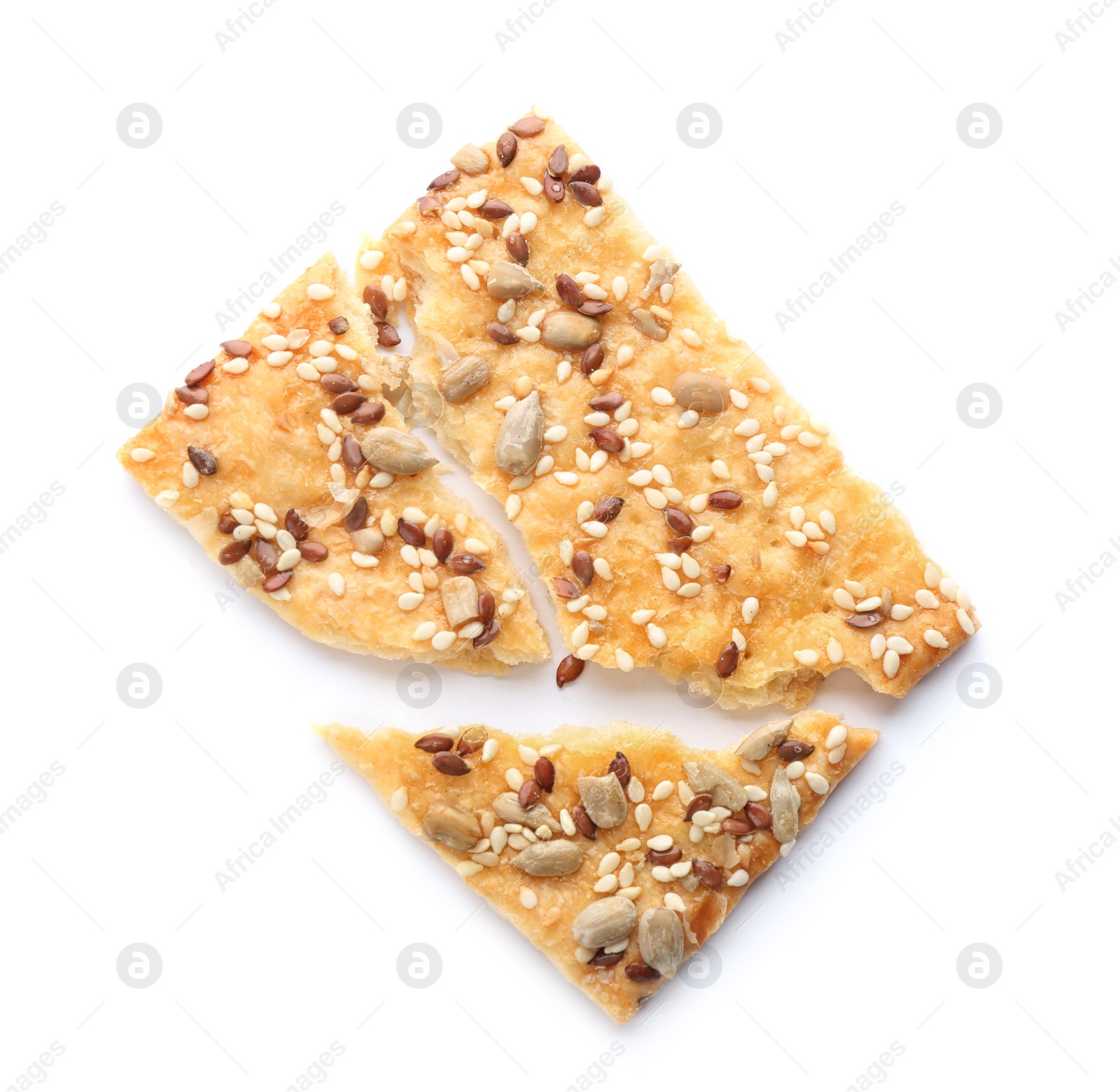Photo of Broken delicious crispy cracker with seeds on white background, top view