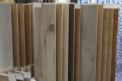 Photo of Many different samples of tiles on display in store