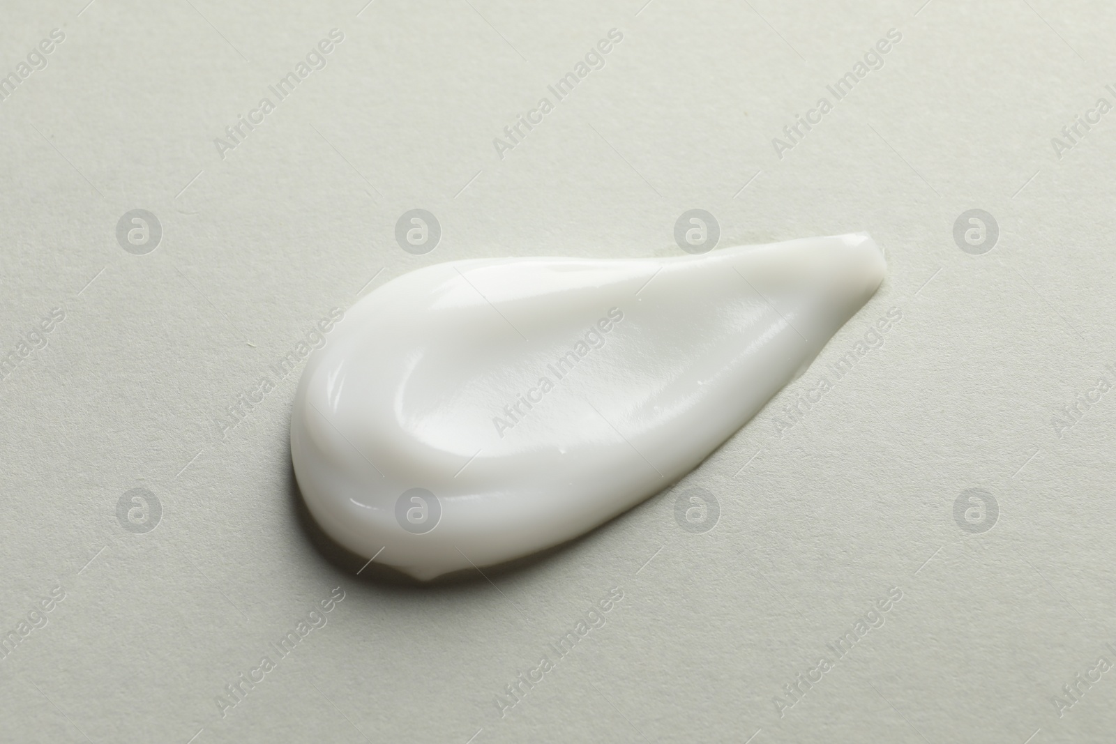 Photo of Sample of face mask on light background, top view