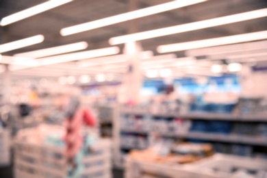 Blurred view of modern shopping mall interior