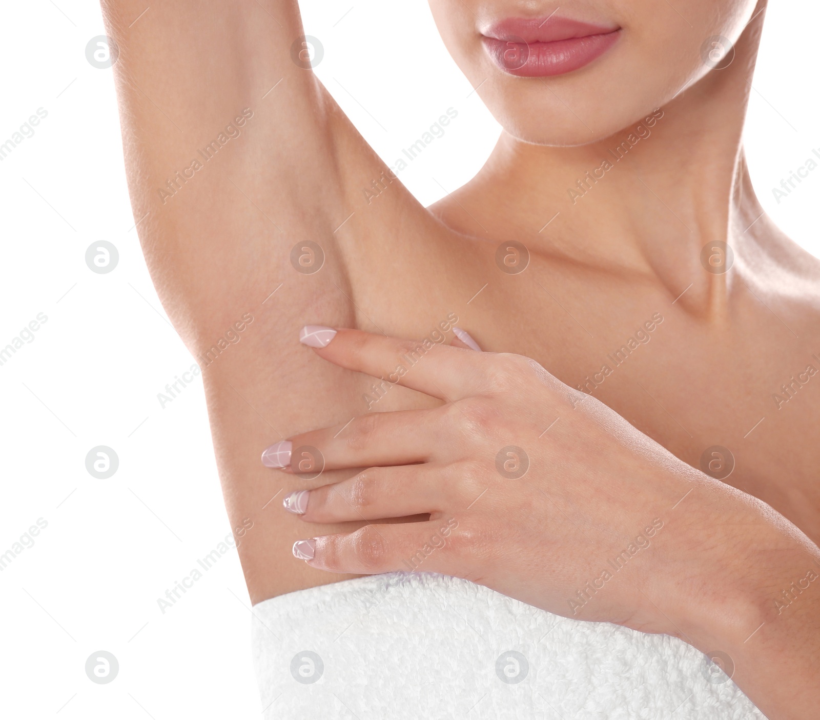 Photo of Young woman showing armpit on white background, closeup. Epilation procedure