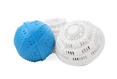 Photo of Many Dryer balls for washing machine on white background. Laundry detergent substitute