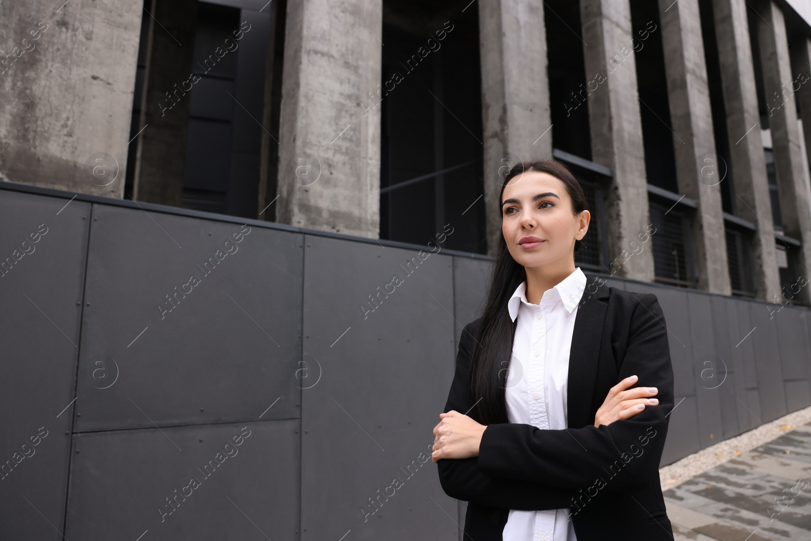 Photo of Portrait of beautiful woman outdoors, space for text. Lawyer, businesswoman, accountant or manager