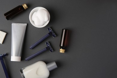 Photo of Flat lay composition with shaving accessories for men on grey background. Space for text