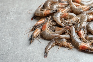 Photo of Fresh shrimps on light background