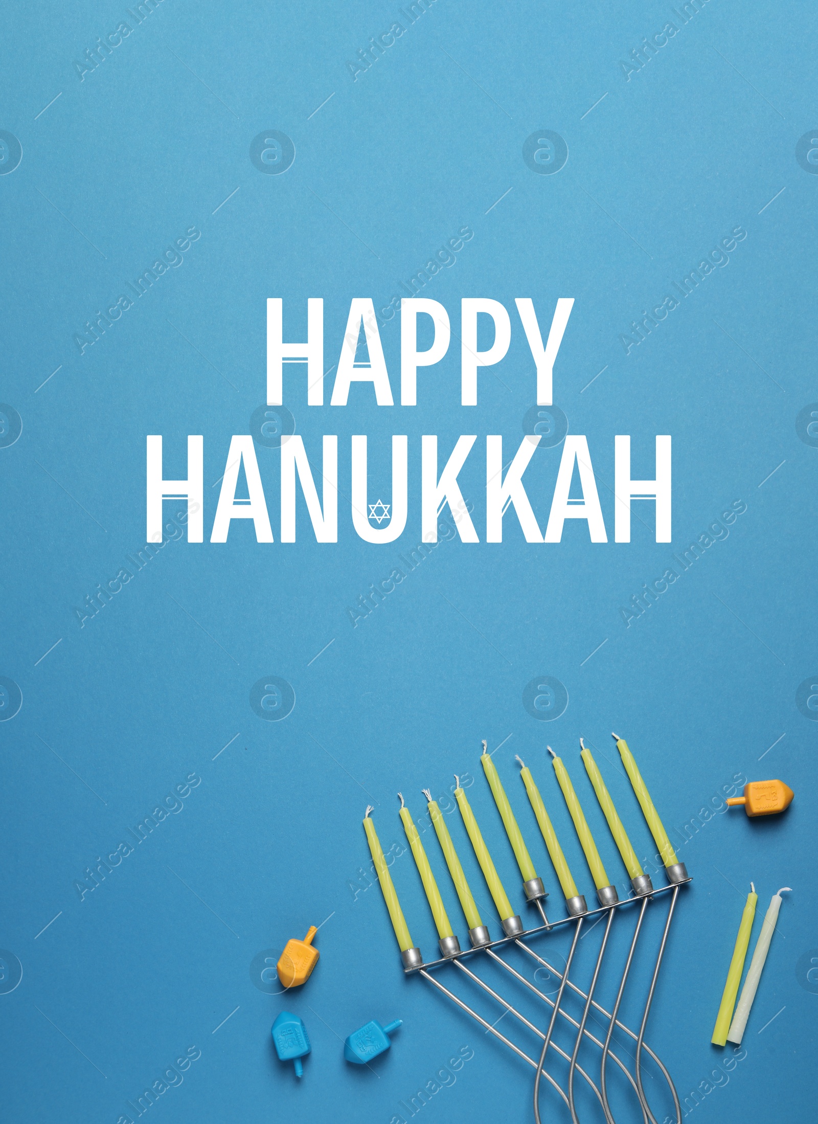 Image of Happy Hanukkah. Menorah, candles and dreidels on light blue background, flat lay