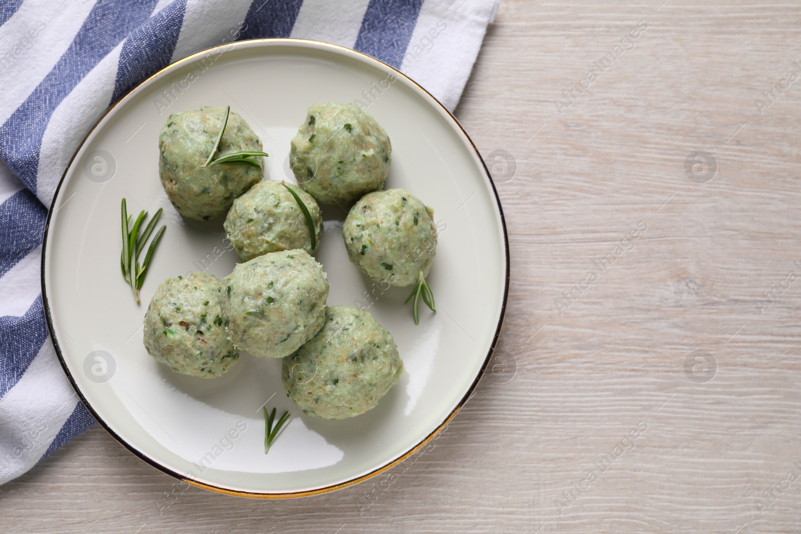 Photo of Tasty falafel balls on white wooden table, top view and space for text. Vegan products