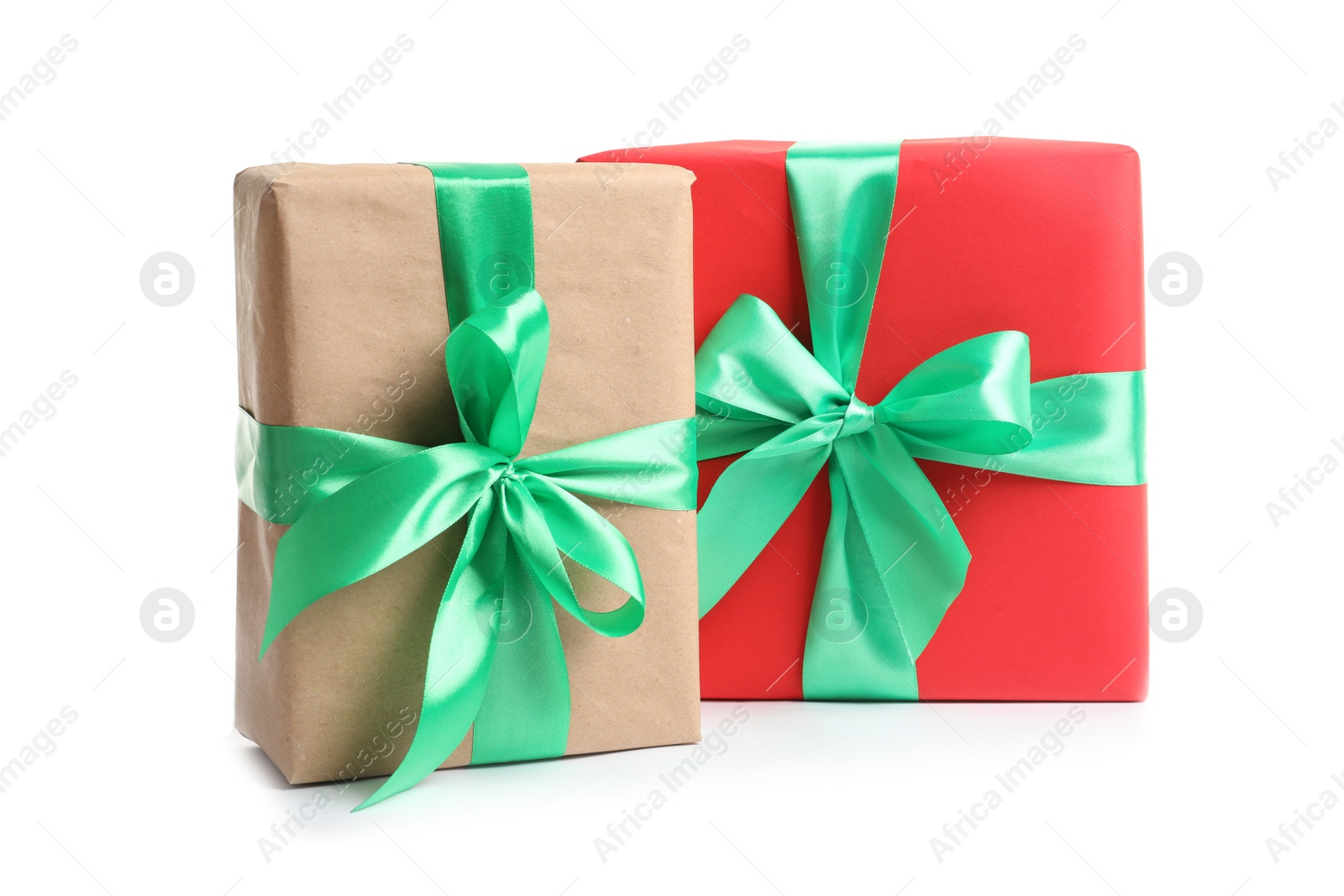 Photo of Beautifully wrapped gift boxes on white background