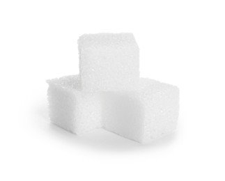 Photo of Three refined sugar cubes isolated on white