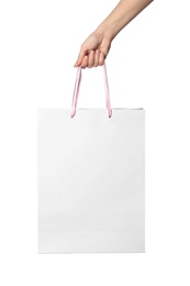 Photo of Woman holding paper shopping bag isolated on white, closeup