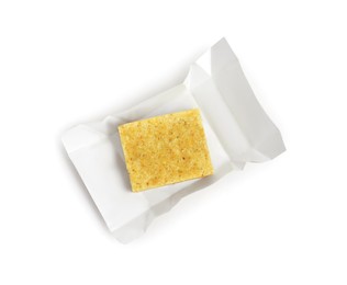 Photo of Unwrapped bouillon cube on white background, top view