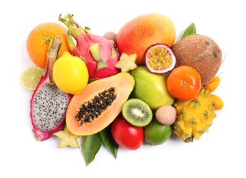 Photo of Pile of different exotic fruits on white background, top view