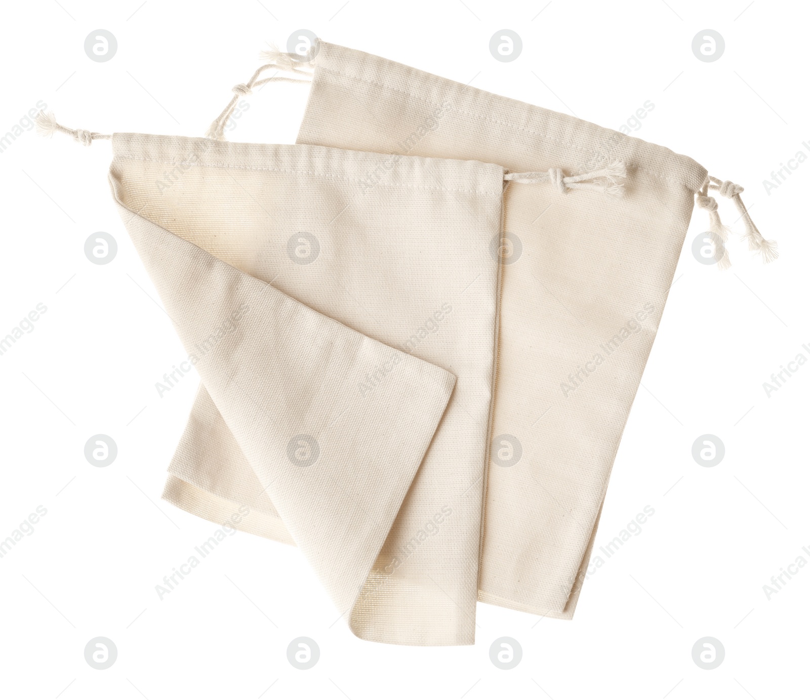 Photo of Cotton eco bags isolated on white, top view