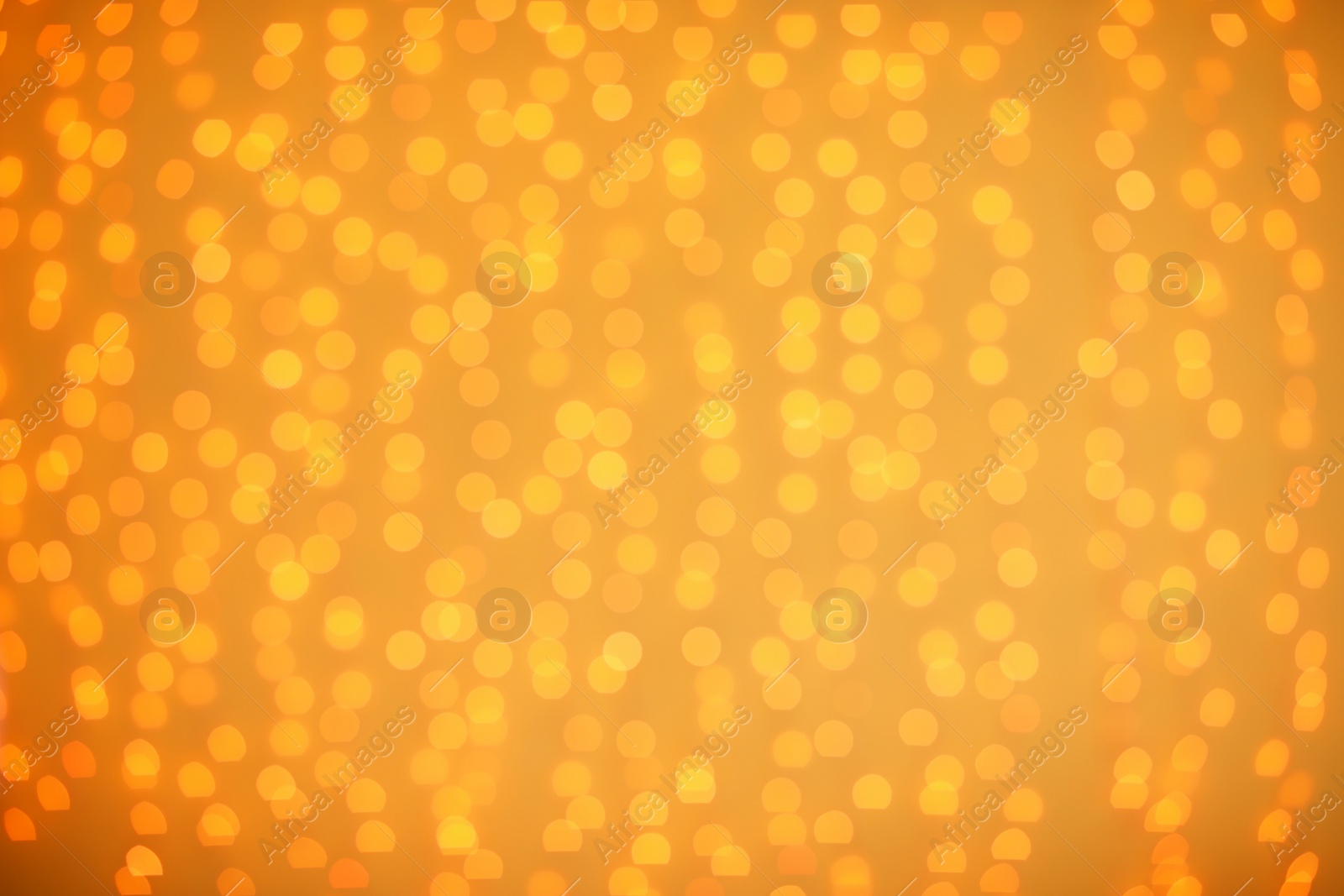 Photo of Beautiful gold lights as background. Bokeh effect