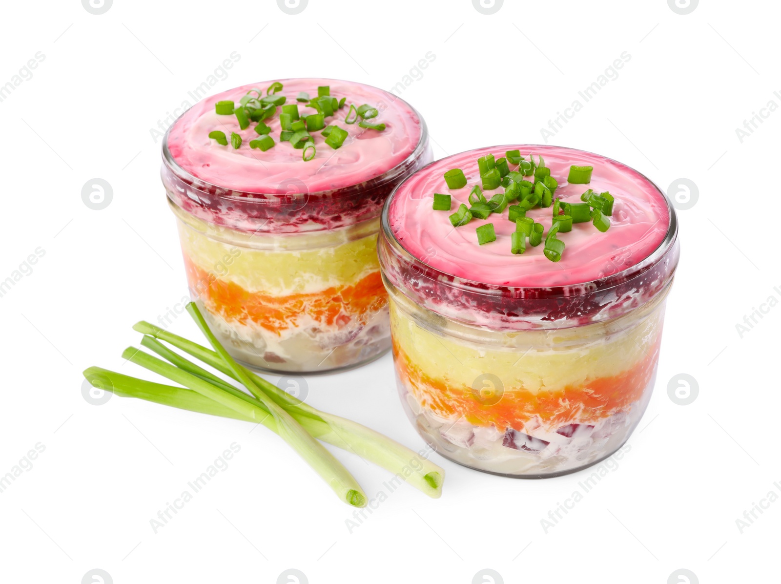 Photo of Jars with herring under fur coat isolated on white. Traditional Russian salad