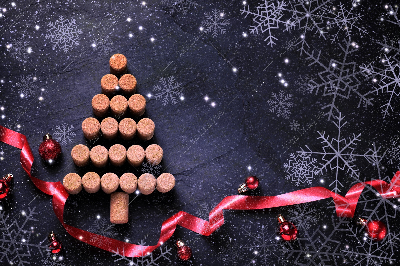 Image of Christmas tree made of wine corks and decor on dark stone background, flat lay