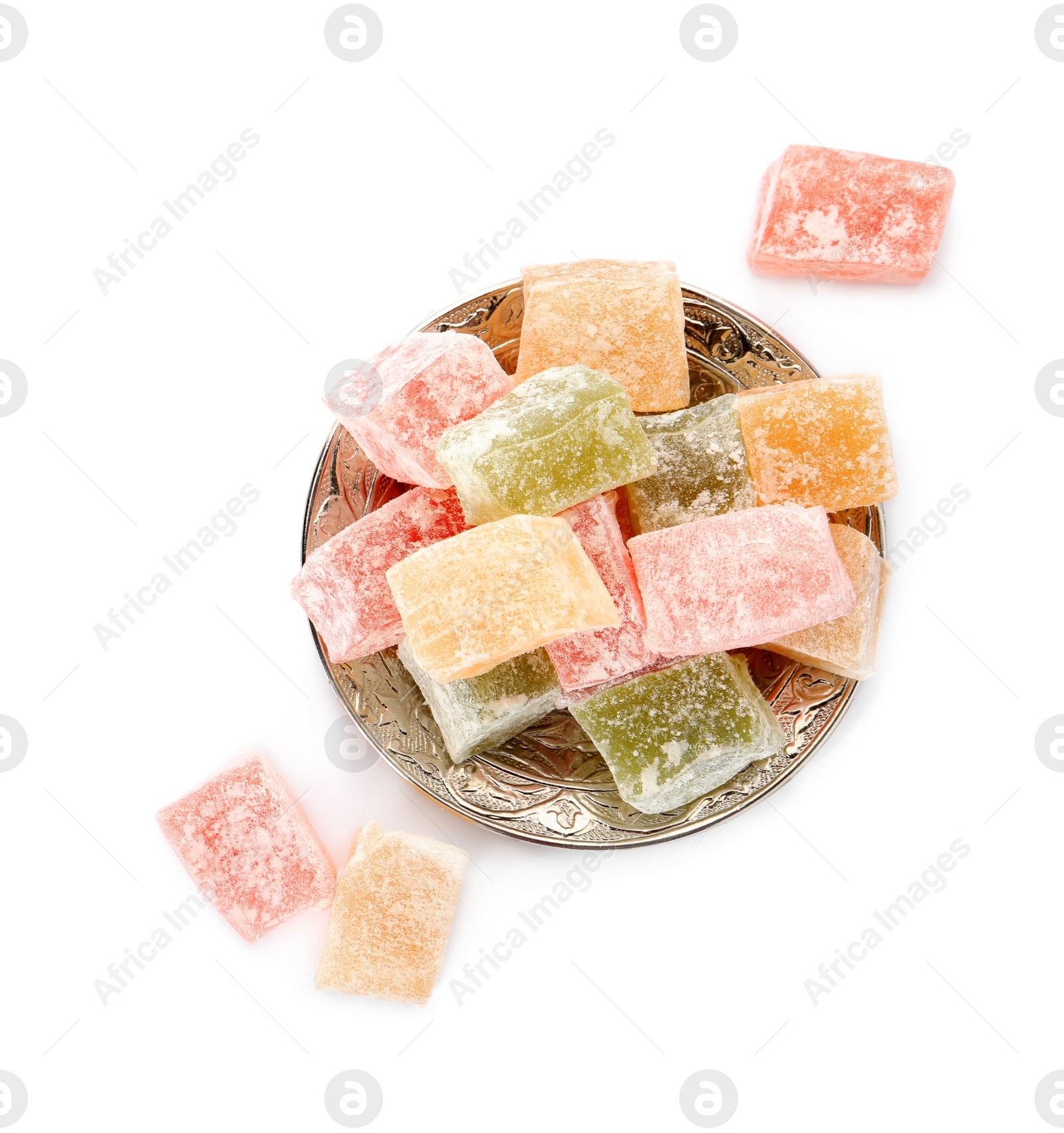 Photo of Turkish delight dessert in plate on white background, top view