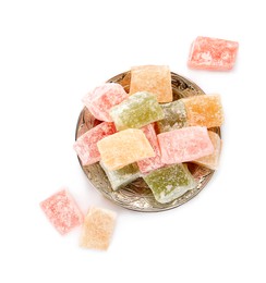 Photo of Turkish delight dessert in plate on white background, top view
