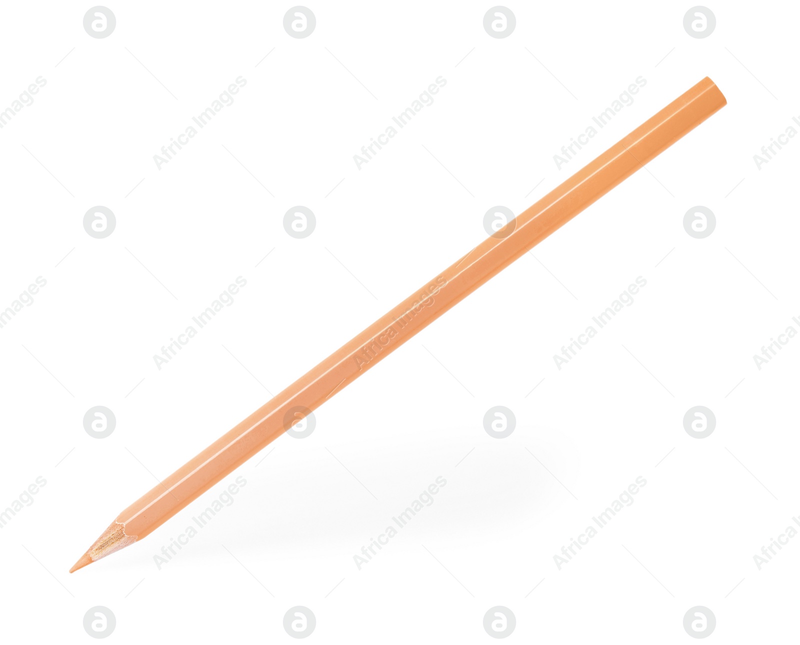 Photo of Apricot wooden pencil on white background. School stationery