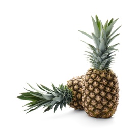 Photo of Fresh pineapples on white background