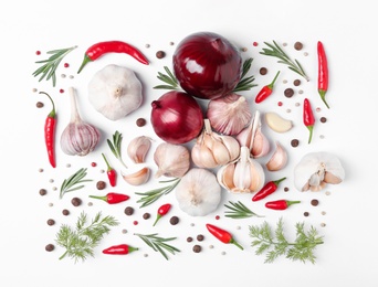 Photo of Composition with garlic, peppers and onions on white background, top view