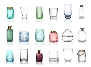 Image of Set of empty glass vases on white background