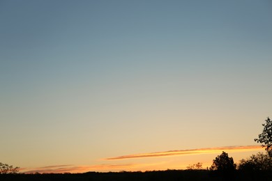 Picturesque view of beautiful blue sky at sunset