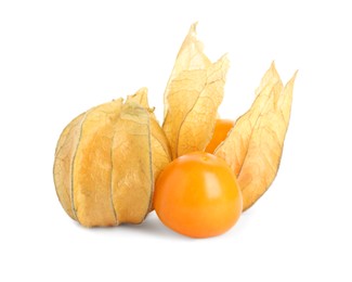 Photo of Ripe physalis fruits with dry husk on white background