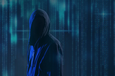 Image of Hacker and digital binary code on dark background. Cyber crime concept