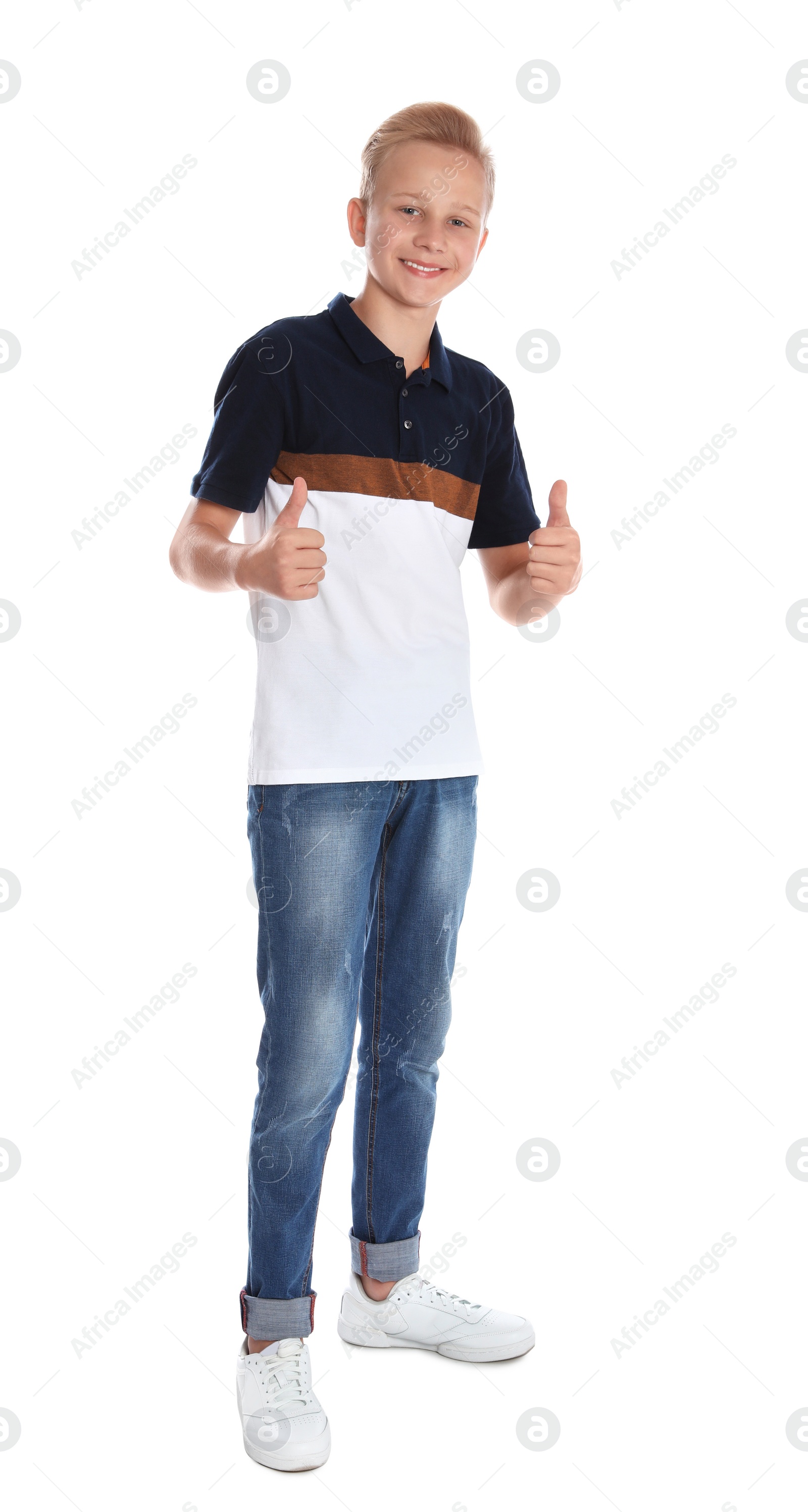 Photo of Full length portrait of teenage boy on white background