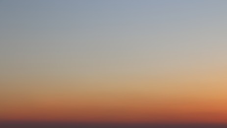 Landscape of city against sky at sunset