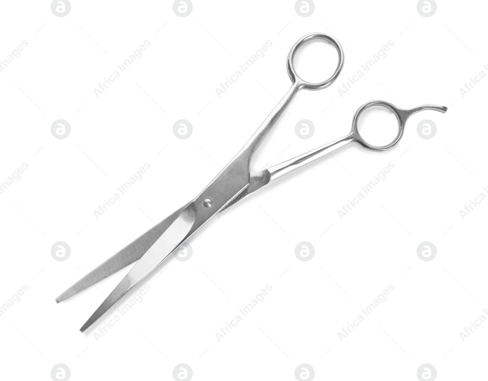 Photo of Pair of sharp hairdresser's scissors on white background