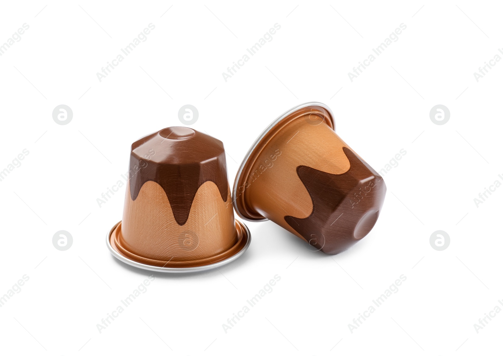 Photo of Two plastic coffee capsules isolated on white