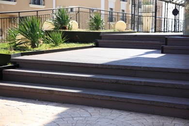 View of beautiful concrete stairs outdoors on sunny day