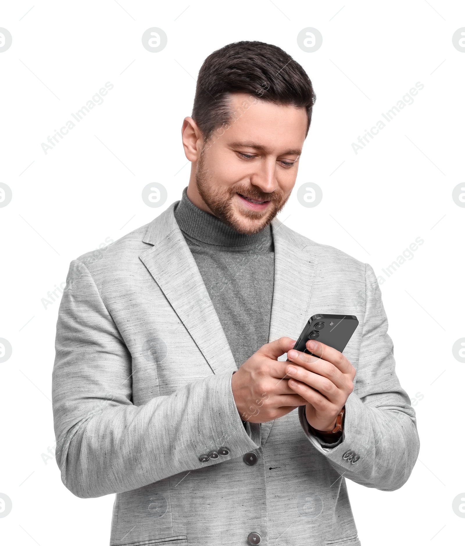 Photo of Handsome bearded businessman with smartphone on white background