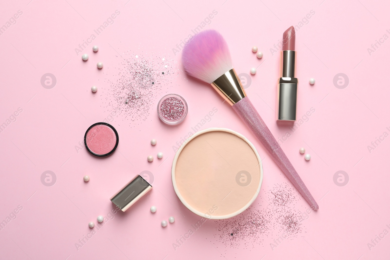 Photo of Flat lay composition with makeup brushes on pink background